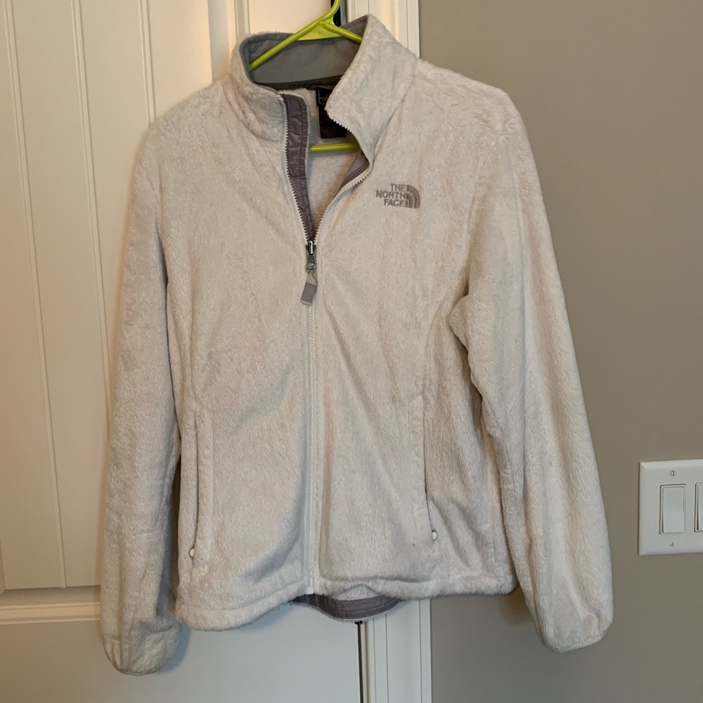Womens furry white north face jacket. Size medium.